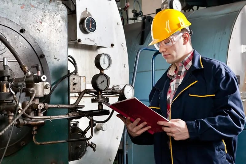 Technician who inspects a machine